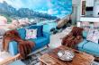Incredible mural photo of Cape Town vista in living area.