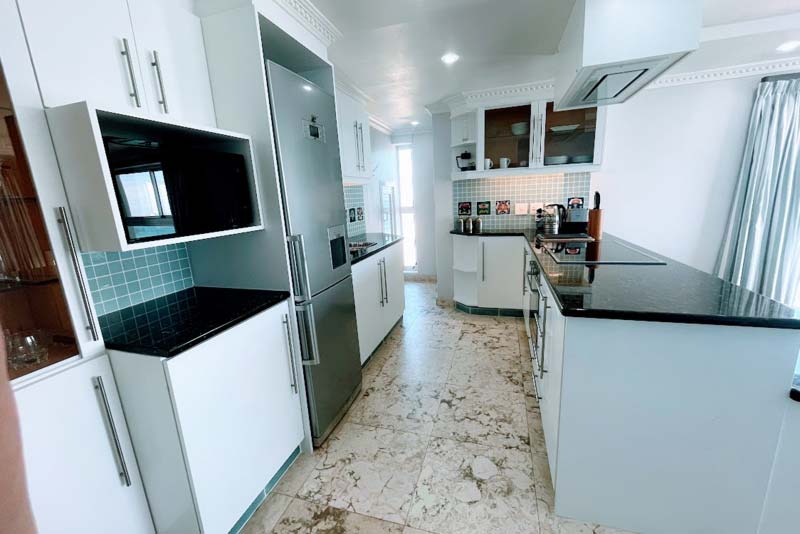 Modern white beachy kitchen.
