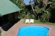 Enjoy the pool with trees and bush surroundings 