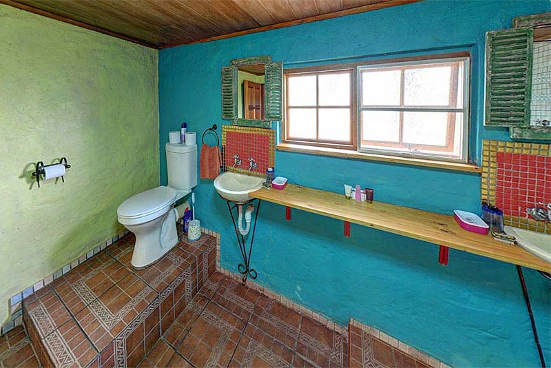 Mexican Loft bathroom with his and hers basins