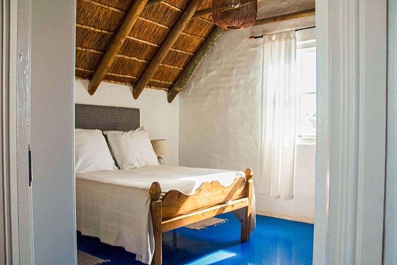 The Thatch apartment upstairs bedroom with bit of view