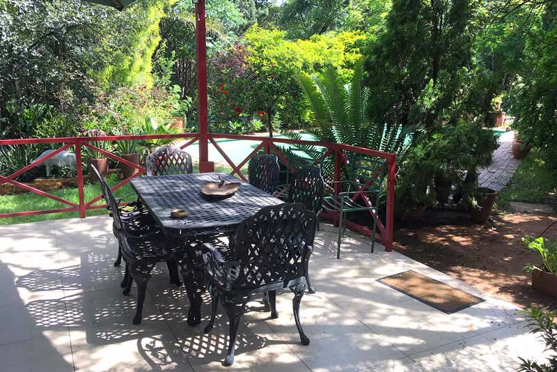 Our Patio under the trees is a perfect spot to relax