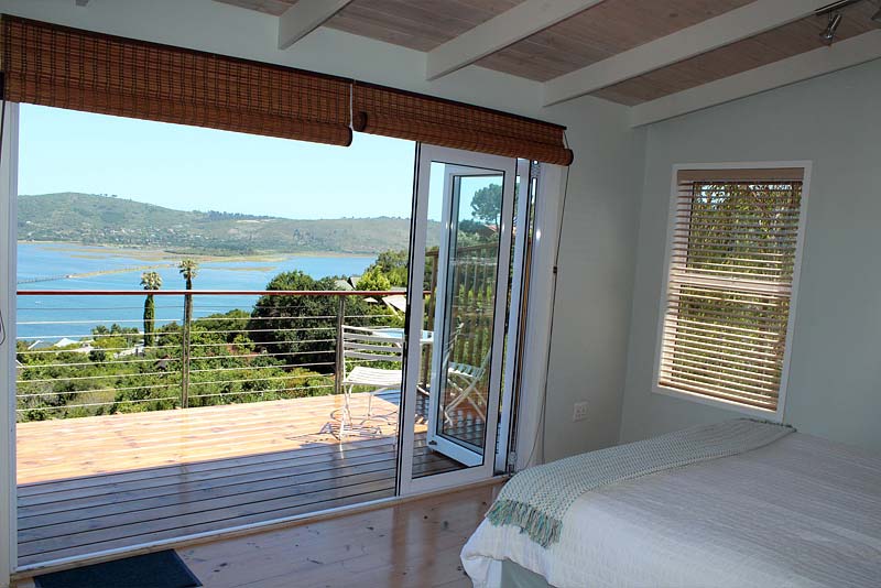 Second bedroom showing private balcony and views