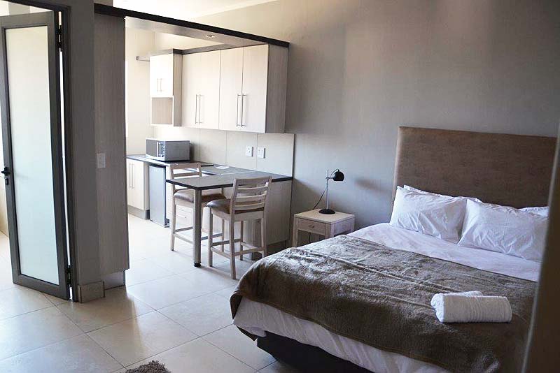 Bedroom & kitchen - Be Still self catering in Swakopmund
