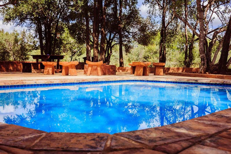 Kudu Camp - Private swimming pool and boma overlooking the natural bush surroundings