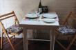 The little dining table and fold up chairs